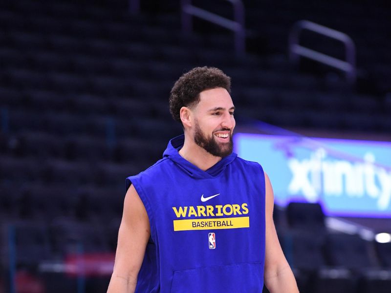 SAN FRANCISCO, CA - DECEMBER 3: Klay Thompson #11 of the Golden State Warriors smiles during warm ups before the game against the Houston Rockets on December 3, 2022 at Chase Center in San Francisco, California. NOTE TO USER: User expressly acknowledges and agrees that, by downloading and or using this photograph, user is consenting to the terms and conditions of Getty Images License Agreement. Mandatory Copyright Notice: Copyright 2022 NBAE (Photo by Noah Graham/NBAE via Getty Images)