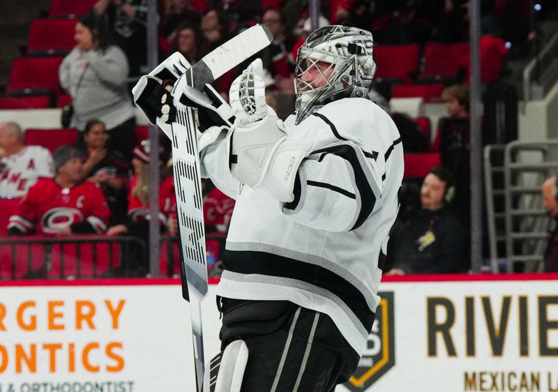 Jan 15, 2024; Raleigh, North Carolina, USA; Los Angeles Kings goaltender David Rittich (31) celebrates his victory against the Carolina Hurricanes at PNC Arena. Mandatory Credit: James Guillory-USA TODAY Sports