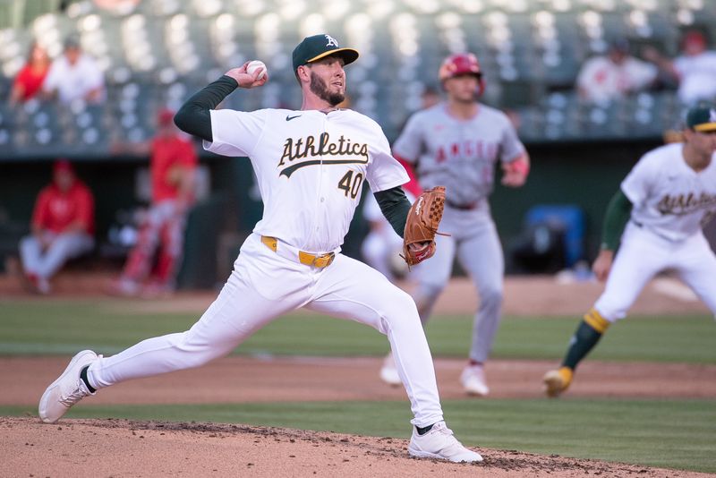 Jul 2, 2024; Oakland, California, USA; Oakland Athletics pitcher Mitch Spence (40) throws a pitch against the Los Angeles Angels during the fourth inning at Oakland-Alameda County Coliseum. Mandatory Credit: Ed Szczepanski-USA TODAY Sports