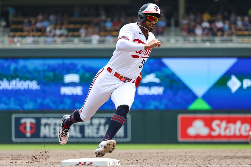 May 24, 2023; Minneapolis, Minnesota, USA; Minnesota Twins left fielder Willi Castro (50) rounds third base to score on a hit by right fielder Matt Wallner (not pictured) during the second inning against the San Francisco Giants at Target Field. Mandatory Credit: Matt Krohn-USA TODAY Sports