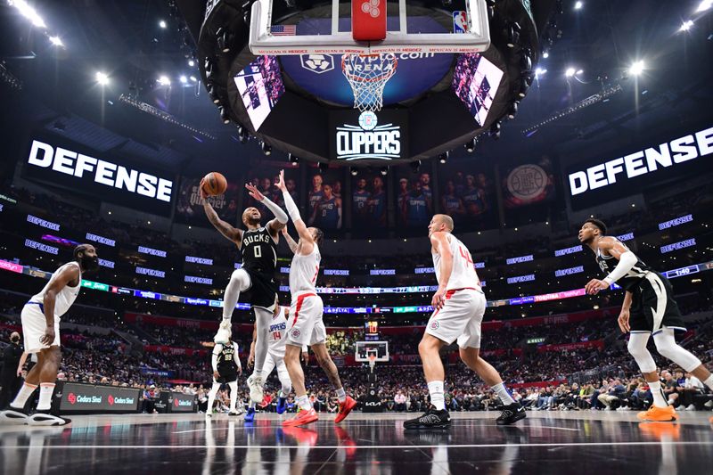 LOS ANGELES, CA - MARCH 10: Damian Lillard #0 of the Milwaukee Bucks shoots the ball during the game against the LA Clippers on March 10, 2024 at Crypto.Com Arena in Los Angeles, California. NOTE TO USER: User expressly acknowledges and agrees that, by downloading and/or using this Photograph, user is consenting to the terms and conditions of the Getty Images License Agreement. Mandatory Copyright Notice: Copyright 2024 NBAE (Photo by Adam Pantozzi/NBAE via Getty Images)