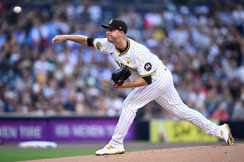 Aug 13, 2024; San Diego, California, USA; San Diego Padres starting pitcher Michael King (34) pitches against the Pittsburgh Pirates during the first inning at Petco Park. Mandatory Credit: Orlando Ramirez-USA TODAY Sports