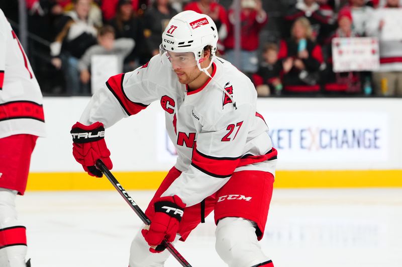 Nov 11, 2024; Las Vegas, Nevada, USA; Carolina Hurricanes center Tyson Jost (27) warms up before a game against the Vegas Golden Knights at T-Mobile Arena. Mandatory Credit: Stephen R. Sylvanie-Imagn Images