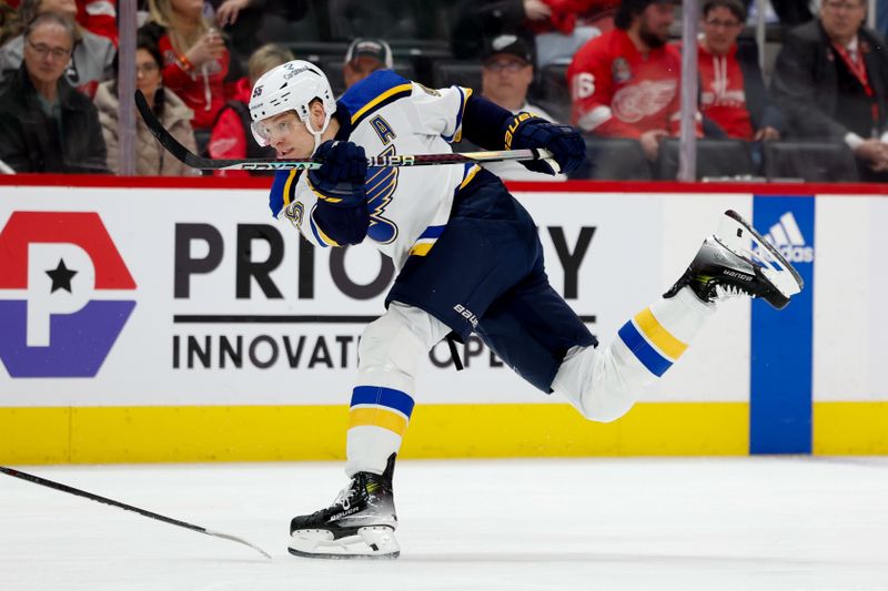 Feb 24, 2024; Detroit, Michigan, USA;  St. Louis Blues defenseman Colton Parayko (55) shoots the puck in the first period against the Detroit Red Wings at Little Caesars Arena. Mandatory Credit: Rick Osentoski-USA TODAY Sports
