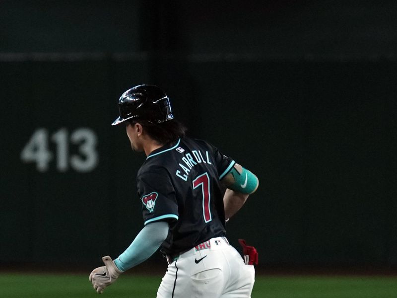 Jul 27, 2024; Phoenix, Arizona, USA; Arizona Diamondbacks outfielder Corbin Carroll (7) runs the bases after hitting a solo home run against the Pittsburgh Pirates during the second inning at Chase Field. Mandatory Credit: Joe Camporeale-USA TODAY Sports