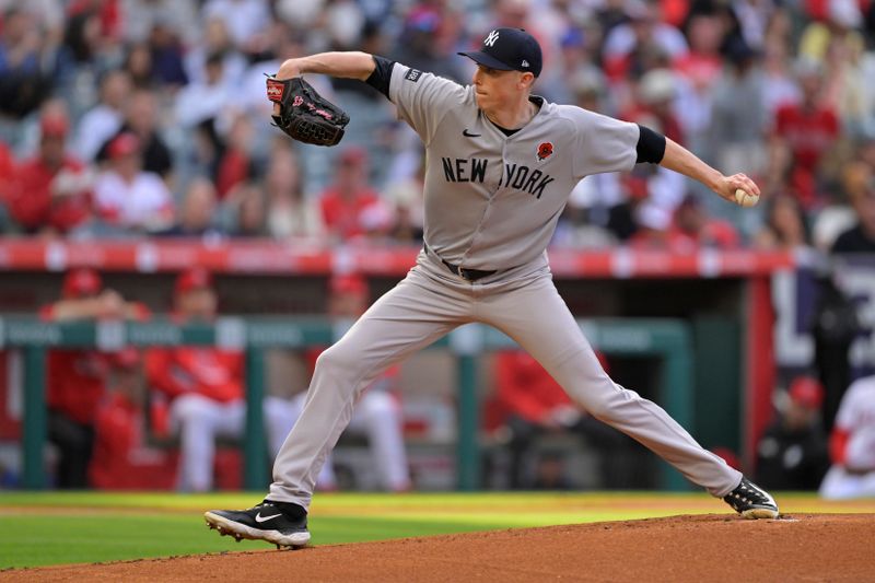 May 26, 2025; Anaheim, California, USA;  New York Yankees starting pitcher Ryan Yarbrough (33) delivers to the plate in the first inning against the Los Angeles Angels at Angel Stadium. Mandatory Credit: Jayne Kamin-Oncea-Imagn Images