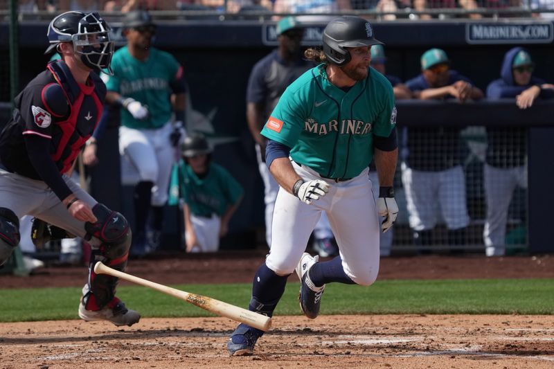 Feb 26, 2026; Peoria, Arizona, USA; Seattle Mariners second baseman Brendan Donovan (33) bats against the Cleveland Guardians in the second inning at Peoria Sports Complex. Mandatory Credit: Rick Scuteri-Imagn Images