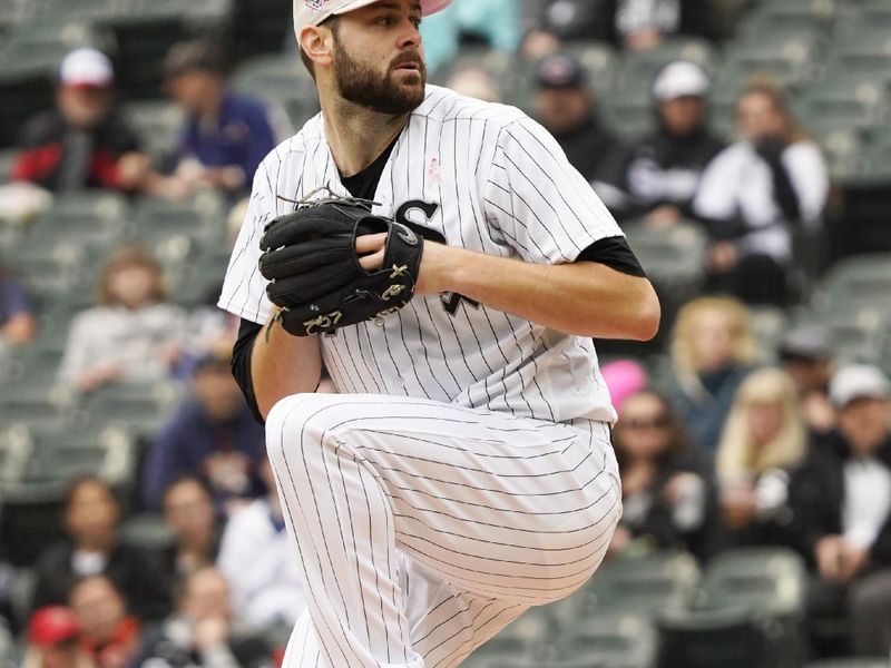 May 14, 2023; Chicago, Illinois, USA; Chicago White Sox starting pitcher Lucas Giolito (27) throws the ball against the Houston Astros during the first inning at Guaranteed Rate Field. Mandatory Credit: David Banks-USA TODAY Sports