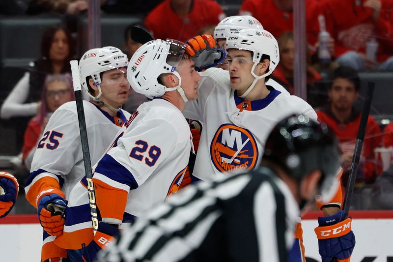 Feb 29, 2024; Detroit, Michigan, USA;  New York Islanders center Brock Nelson (29) receives congratulations from teammates after scoring at Little Caesars Arena. Mandatory Credit: Rick Osentoski-USA TODAY Sports