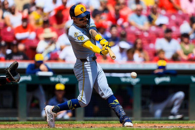 Aug 17, 2025; Cincinnati, Ohio, USA; Milwaukee Brewers shortstop Joey Ortiz (3) bats against the Cincinnati Reds in the third inning at Great American Ball Park. Mandatory Credit: Katie Stratman-Imagn Images