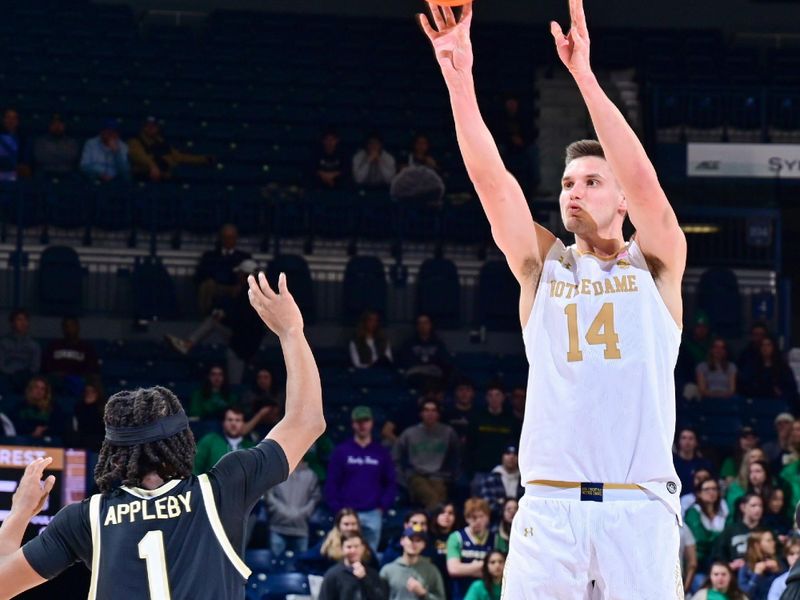 Feb 4, 2023; South Bend, Indiana, USA; Notre Dame Fighting Irish forward Nate Laszewski (14) attempts a three point basket overWake Forest Demon Deacons guard Tyree Appleby (1) in the second half at the Purcell Pavilion. Mandatory Credit: Matt Cashore-USA TODAY Sports