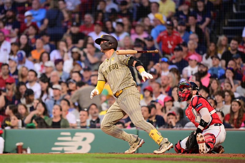 Jun 28, 2024; Boston, Massachusetts, USA; San Diego Padres catcher Kyle Higashioka (20) hits a two-run home run against the Boston Red Sox during the fifth inning at Fenway Park. Mandatory Credit: Eric Canha-USA TODAY Sports
