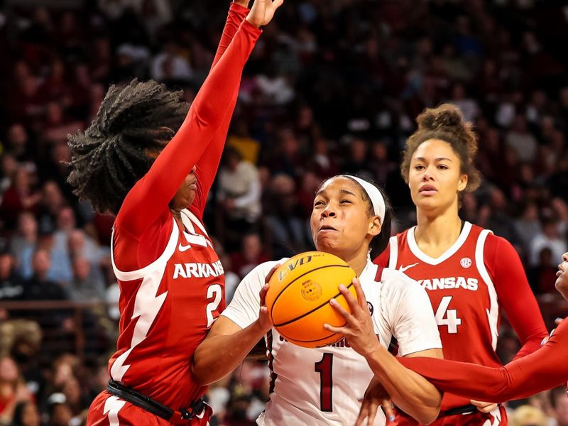 Jan 22, 2023; Columbia, South Carolina, USA; South Carolina Gamecocks guard Zia Cooke (1) is fouled by Arkansas Razorbacks guard Makayla Daniels (43) in the first half at Colonial Life Arena. Mandatory Credit: Jeff Blake-USA TODAY Sports