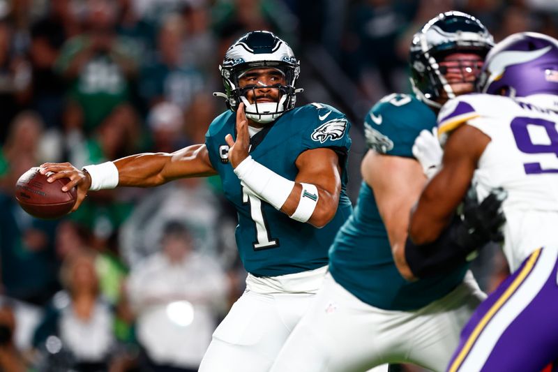 Philadelphia Eagles quarterback Jalen Hurts (1) in action against the Minnesota Vikings during an NFL football game, Thursday, Sep. 14, 2023, in Philadelphia. (AP Photo/Rich Schultz)