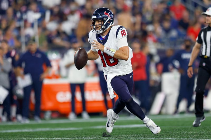 Houston Texans quarterback Case Keenum (18) scrambles out of the pocket during the second half of an NFL pre-season football game against the New England Patriots, Thursday, Aug. 10, 2023, in Foxborough, Mass. (AP Photo/Greg M. Cooper)