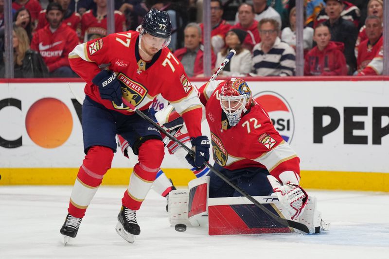 Jun 1, 2024; Sunrise, Florida, USA; Florida Panthers goaltender Sergei Bobrovsky (72) makes a save as defenseman Niko Mikkola (77) clears the zone against the New York Rangers during the first period in game six of the Eastern Conference Final of the 2024 Stanley Cup Playoffs at Amerant Bank Arena. Mandatory Credit: Jim Rassol-USA TODAY Sports