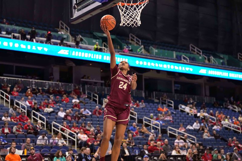 Mar 8, 2024; Greensboro, NC, USA; Florida State Seminoles guard Amaya Bonner (24) completes a fast break in the second half  at Greensboro Coliseum. Mandatory Credit: David Yeazell-USA TODAY Sportsagainst the Syracuse Orange