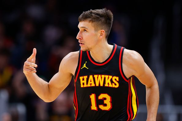 ATLANTA, GEORGIA - NOVEMBER 15: Bogdan Bogdanovic #13 of the Atlanta Hawks reacts after a three pointer during the first half against the New York Knicks at State Farm Arena on November 15, 2023 in Atlanta, Georgia. NOTE TO USER: User expressly acknowledges and agrees that, by downloading and or using this photograph, User is consenting to the terms and conditions of the Getty Images License Agreement. (Photo by Todd Kirkland/Getty Images)