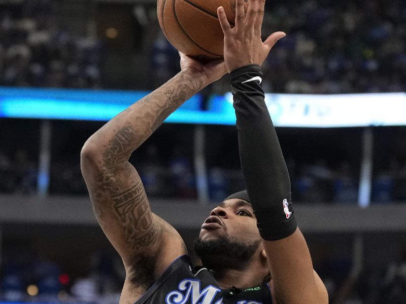 DALLAS, TEXAS - APRIL 12: Jaden Hardy #1 of the Dallas Mavericks shoots during the first half against the Detroit Pistons at American Airlines Center on April 12, 2024 in Dallas, Texas. NOTE TO USER: User expressly acknowledges and agrees that, by downloading and or using this photograph, User is consenting to the terms and conditions of the Getty Images License Agreement. (Photo by Sam Hodde/Getty Images)