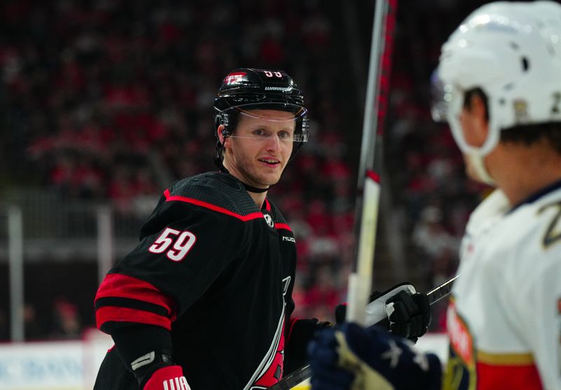 Mar 14, 2024; Raleigh, North Carolina, USA; Carolina Hurricanes left wing Jake Guentzel (59) looks on against the Florida Panthers during the first period at PNC Arena. Mandatory Credit: James Guillory-USA TODAY Sports