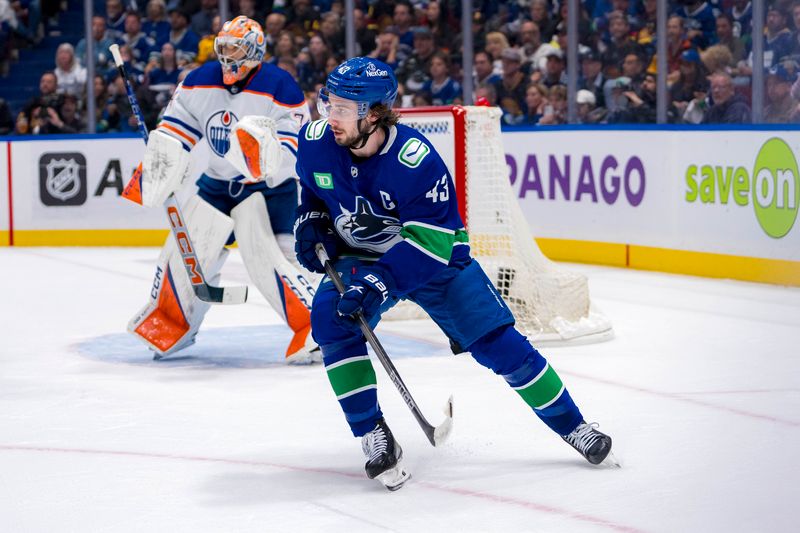 May 20, 2024; Vancouver, British Columbia, CAN; Vancouver Canucks defenseman Quinn Hughes (43) skates against the Edmonton Oilers during the first period in game seven of the second round of the 2024 Stanley Cup Playoffs at Rogers Arena. Mandatory Credit: Bob Frid-USA TODAY Sports