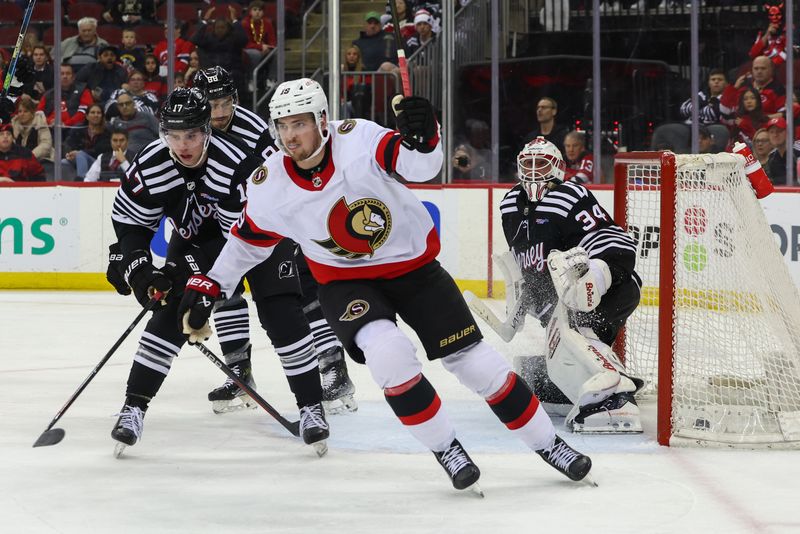 Mar 23, 2024; Newark, New Jersey, USA; Ottawa Senators right wing Drake Batherson (19) celebrates his goal against the New Jersey Devils during the third period at Prudential Center. Mandatory Credit: Ed Mulholland-USA TODAY Sports