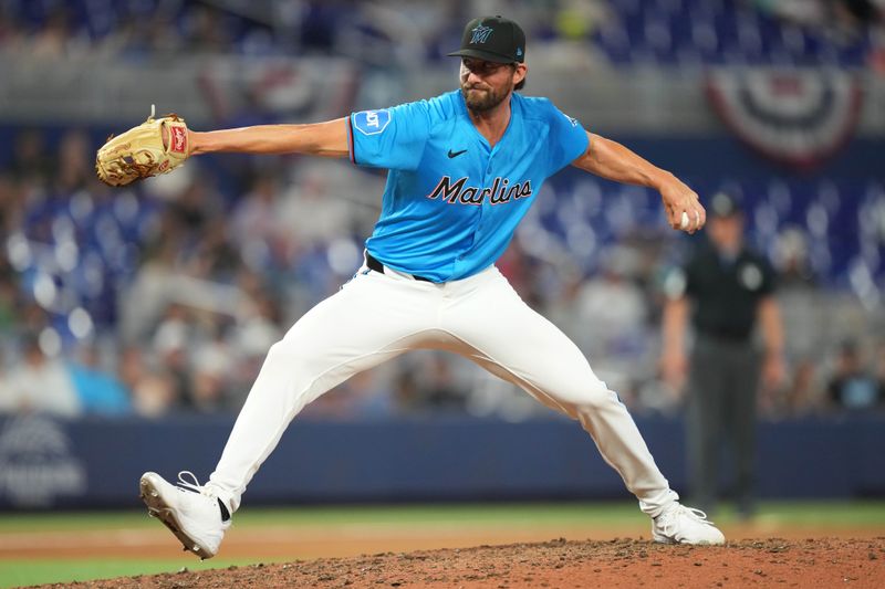 Apr 3, 2024; Miami, Florida, USA; Miami Marlins relief  pitcher Kent Emanuel (74) pitches in the seventh inning against the Los Angeles Angels at loanDepot Park. Mandatory Credit: Jim Rassol-USA TODAY Sports