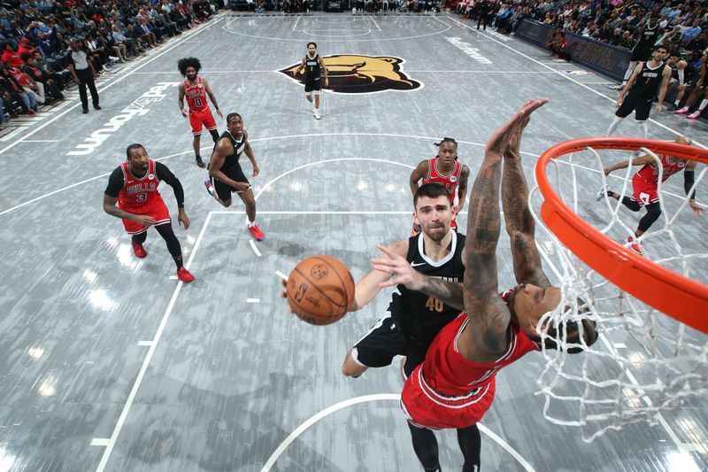 MEMPHIS, TN - FEBRUARY 8: John Konchar #46 of the Memphis Grizzlies drives to the basket during the game against the Chicago Bulls on February 8, 2024 at FedExForum in Memphis, Tennessee. NOTE TO USER: User expressly acknowledges and agrees that, by downloading and or using this photograph, User is consenting to the terms and conditions of the Getty Images License Agreement. Mandatory Copyright Notice: Copyright 2024 NBAE (Photo by Joe Murphy/NBAE via Getty Images)