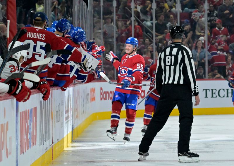 Sep 24, 2024; Montreal, Quebec, CAN; Montreal Canadiens forward Michael Pezzetta (55) celebrates with teammates after scoring a goal against the New Jersey Devils during the second period at the Bell Centre. Mandatory Credit: Eric Bolte-Imagn Images