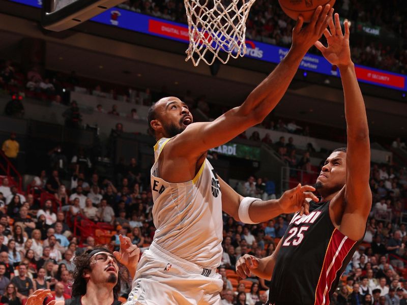 MIAMI, FL - MARCH 2: Talen Horton-Tucker #5 of the Utah Jazz drives to the basket during the game against the Miami Heat on March 2, 2024 at Kaseya Center in Miami, Florida. NOTE TO USER: User expressly acknowledges and agrees that, by downloading and or using this Photograph, user is consenting to the terms and conditions of the Getty Images License Agreement. Mandatory Copyright Notice: Copyright 2024 NBAE (Photo by Issac Baldizon/NBAE via Getty Images)