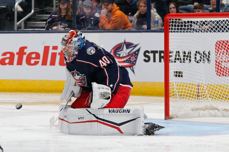 Mar 16, 2024; Columbus, Ohio, USA; Columbus Blue Jackets goalie Daniil Tarasov (40) makes a save against the San Jose Sharks during the second period at Nationwide Arena. Mandatory Credit: Russell LaBounty-USA TODAY Sports