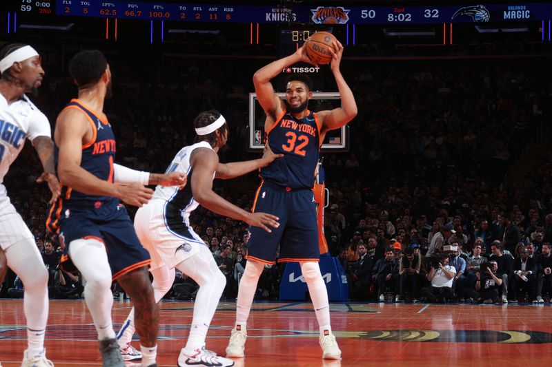 NEW YORK, NY - DECEMBER 3: Karl-Anthony Towns #32 of the New York Knicks handles the ball during the game against the Orlando Magic during the Emirates NBA Cup on December 3, 2024 at Madison Square Garden in New York City, New York.  NOTE TO USER: User expressly acknowledges and agrees that, by downloading and or using this photograph, User is consenting to the terms and conditions of the Getty Images License Agreement. Mandatory Copyright Notice: Copyright 2024 NBAE  (Photo by Nathaniel S. Butler/NBAE via Getty Images)