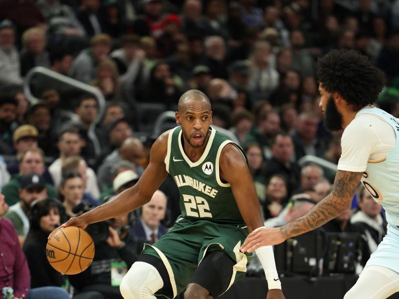 MILWAUKEE, WI - JANUARY 8: Khris Middleton #22 of the Milwaukee Bucks drives to the basket during the game against the San Antonio Spurs on January 8, 2025 at Fiserv Forum Center in Milwaukee, Wisconsin. NOTE TO USER: User expressly acknowledges and agrees that, by downloading and or using this Photograph, user is consenting to the terms and conditions of the Getty Images License Agreement. Mandatory Copyright Notice: Copyright 2025 NBAE (Photo by Mike E. Roemer/NBAE via Getty Images).