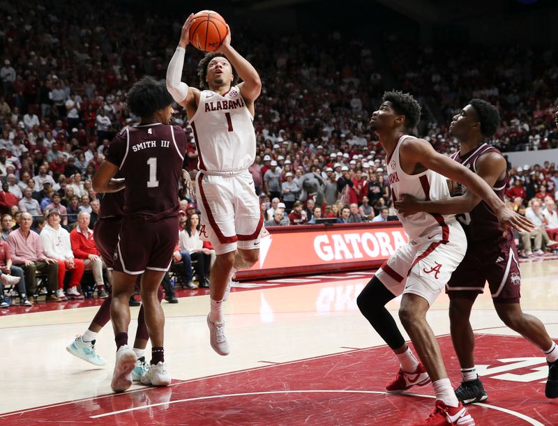 Feb 3, 2024; Tuscaloosa, Alabama, USA; Alabama guard Mark Sears (1) goes for the basket for a score with Mississippi State forward Tolu Smith III (1) defending at Coleman Coliseum. Mandatory Credit: Gary Cosby Jr.-USA TODAY Sports