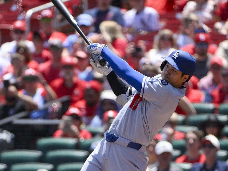 Jun 8, 2025; St. Louis, Missouri, USA;  Los Angeles Dodgers designated hitter Shohei Ohtani (17) hits a double against the St. Louis Cardinals during the first inning at Busch Stadium. Mandatory Credit: Jeff Curry-Imagn Images