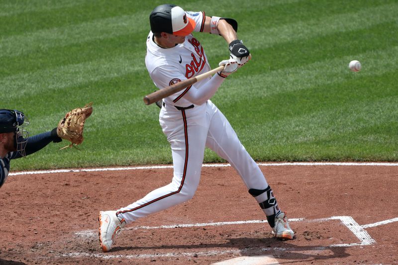 Jun 29, 2025; Baltimore, Maryland, USA; Baltimore Orioles first baseman Coby Mayo (16) hits an RBI single during the fifth inning against the Tampa Bay Rays at Oriole Park at Camden Yards. Mandatory Credit: Daniel Kucin Jr.-Imagn Images