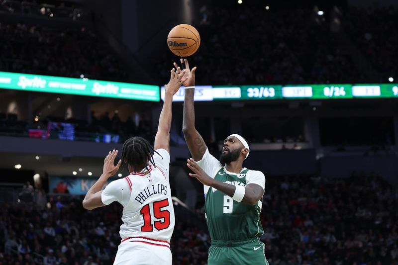 MILWAUKEE, WISCONSIN - OCTOBER 25: Bobby Portis #9 of the Milwaukee Bucks shoots over Julian Phillips #15 of the Chicago Bulls during the second half of a game at Fiserv Forum on October 25, 2024 in Milwaukee, Wisconsin. NOTE TO USER: User expressly acknowledges and agrees that, by downloading and or using this photograph, User is consenting to the terms and conditions of the Getty Images License Agreement. (Photo by Stacy Revere/Getty Images)