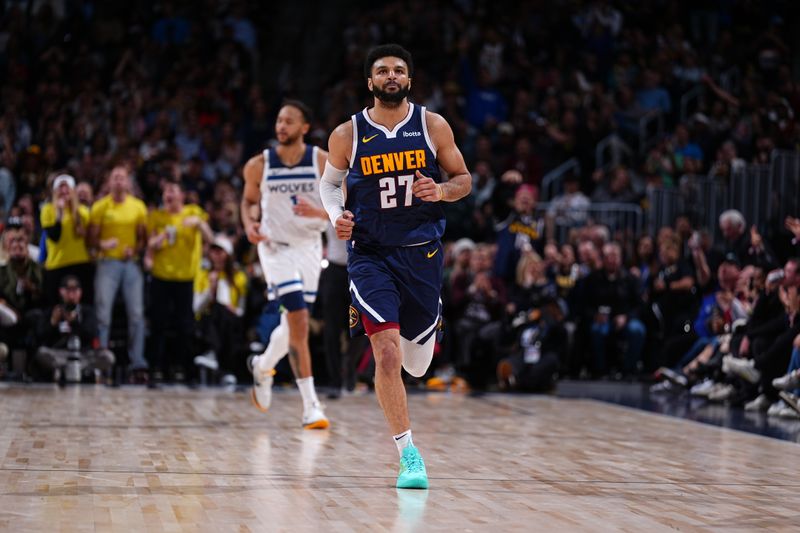 DENVER, CO - APRIL 10: Jamal Murray #27 of the Denver Nuggets looks on during the game against the Minnesota Timberwolves on April 10, 2024 at the Ball Arena in Denver, Colorado. NOTE TO USER: User expressly acknowledges and agrees that, by downloading and/or using this Photograph, user is consenting to the terms and conditions of the Getty Images License Agreement. Mandatory Copyright Notice: Copyright 2024 NBAE (Photo by Garrett Ellwood/NBAE via Getty Images)