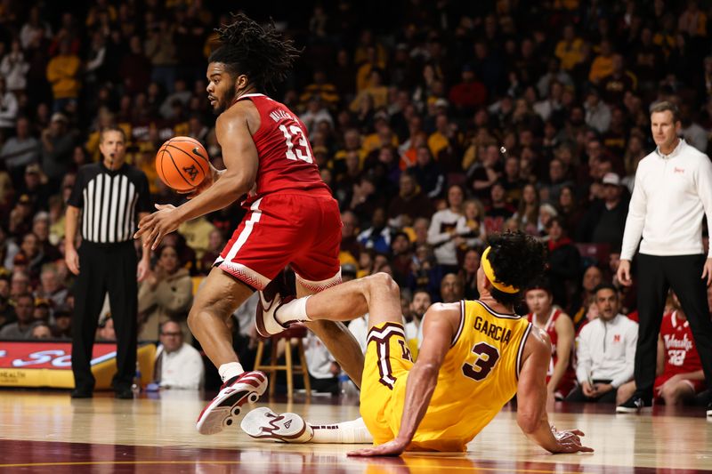 Jan 7, 2023; Minneapolis, Minnesota, USA; Minnesota Golden Gophers forward Dawson Garcia (3) is called for a foul against Nebraska Cornhuskers forward Derrick Walker (13) during overtime at Williams Arena. Mandatory Credit: Matt Krohn-USA TODAY Sports