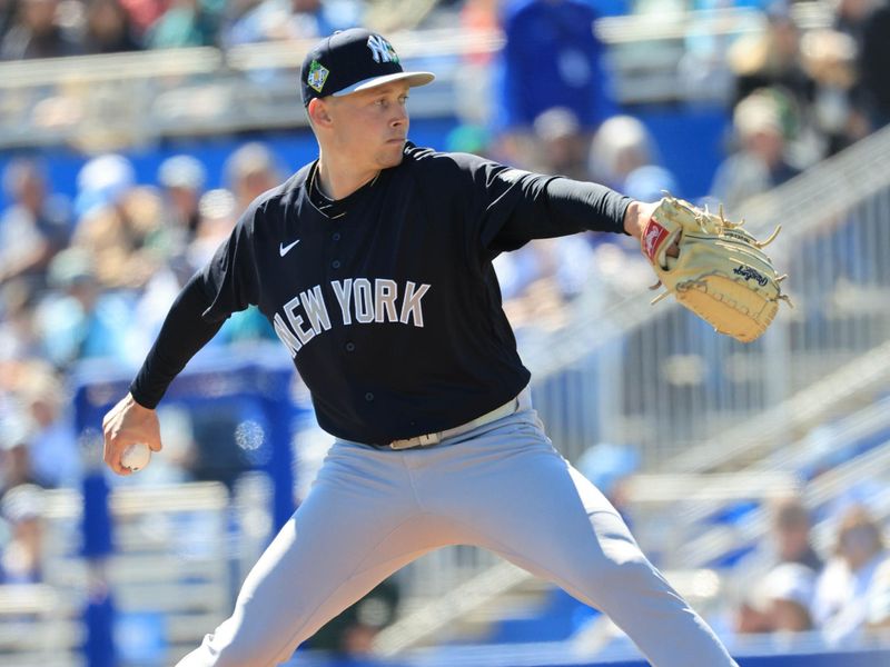 Feb 24, 2026; Dunedin, Florida, USA;  New York Yankees starting pitcher Will Warren (98) throws a pitch during the first inning against the Toronto Blue Jays at TD Ballpark. Mandatory Credit: Kim Klement Neitzel-Imagn Images
