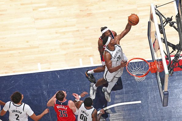 WASHINGTON, DC -? DECEMBER 29: Day'Ron Sharpe #20 of the Brooklyn Nets rebounds the ball during the game against the Washington Wizards on December 29, 2023 at Capital One Arena in Washington, DC. NOTE TO USER: User expressly acknowledges and agrees that, by downloading and or using this Photograph, user is consenting to the terms and conditions of the Getty Images License Agreement. Mandatory Copyright Notice: Copyright 2023 NBAE (Photo by Stephen Gosling/NBAE via Getty Images)