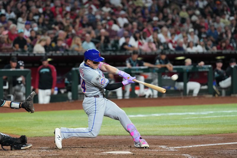 Aug 28, 2024; Phoenix, Arizona, USA; New York Mets outfielder Harrison Bader (44) hits a two run home run against the Arizona Diamondbacks during the fifth inning at Chase Field. Mandatory Credit: Joe Camporeale-USA TODAY Sports