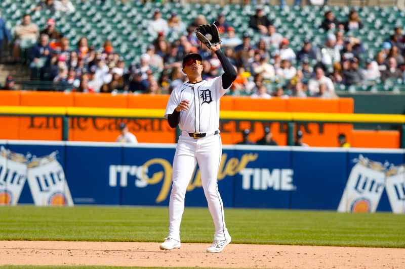 Apr 7, 2024; Detroit, Michigan, USA; Detroit Tigers third baseman Gio Urshela (13)  catches a fly ball during the game against the Oakland Athletics at Comerica Park. Mandatory Credit: Brian Bradshaw Sevald-USA TODAY Sports