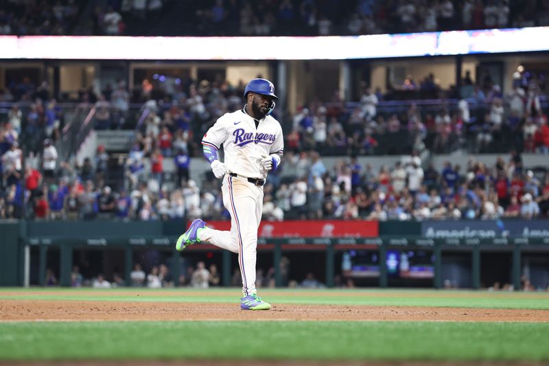 May 14, 2025; Arlington, Texas, USA; Texas Rangers outfielder Adolis García (53) rounds the bases after hitting a two run home run against the Colorado Rockies during the sixth inning at Globe Life Field. Mandatory Credit: Tim Heitman-Imagn Images