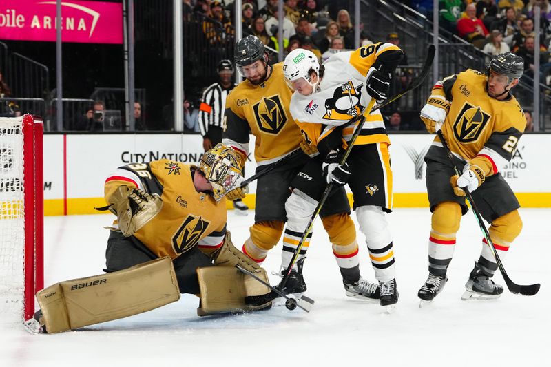 Jan 20, 2024; Las Vegas, Nevada, USA; Vegas Golden Knights goaltender Logan Thompson (36) makes a save after Pittsburgh Penguins right wing Rickard Rakell (67) deflects an incoming shot during the second period at T-Mobile Arena. Mandatory Credit: Stephen R. Sylvanie-USA TODAY Sports