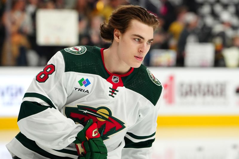 Apr 12, 2024; Las Vegas, Nevada, USA; Minnesota Wild left wing Liam Ohgren (28) takes a rookie lap before the start of a game against the Vegas Golden Knights at T-Mobile Arena. Mandatory Credit: Stephen R. Sylvanie-USA TODAY Sports