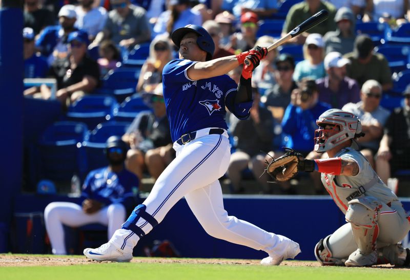 Feb 21, 2026; Dunedin, Florida, USA;  Toronto Blue Jays infielder Kazuma Okamoto (7) at bat during the fourth inning against the Philadelphia Phillies at TD Ballpark. Mandatory Credit: Kim Klement Neitzel-Imagn Images