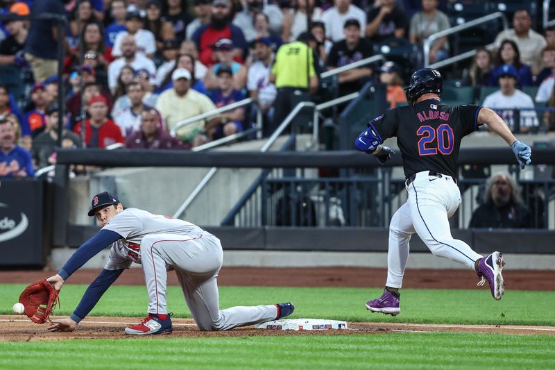 Sep 2, 2024; New York City, New York, USA;  New York Mets first base Pete Alonso (20) is out at first base after Boston Red Sox first baseman Triston Casas (36) fields a low throw in the first inning at Citi Field. Mandatory Credit: Wendell Cruz-USA TODAY Sports