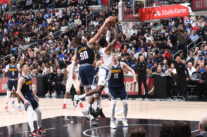 LOS ANGELES, CA - APRIL 4: Aaron Gordon #50 of the Denver Nuggets blocks the shot during the game against the LA Clippers on April 4, 2024 at Crypto.Com Arena in Los Angeles, California. NOTE TO USER: User expressly acknowledges and agrees that, by downloading and/or using this Photograph, user is consenting to the terms and conditions of the Getty Images License Agreement. Mandatory Copyright Notice: Copyright 2024 NBAE (Photo by Adam Pantozzi/NBAE via Getty Images)