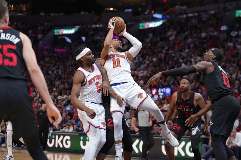 MIAMI, FL - APRIL 2: Jalen Brunson #11 of the New York Knicks shoots the ball during the game against the Miami Heat on April 2, 2024 at Kaseya Center in Miami, Florida. NOTE TO USER: User expressly acknowledges and agrees that, by downloading and or using this Photograph, user is consenting to the terms and conditions of the Getty Images License Agreement. Mandatory Copyright Notice: Copyright 2024 NBAE (Photo by Eric Espada/NBAE via Getty Images)